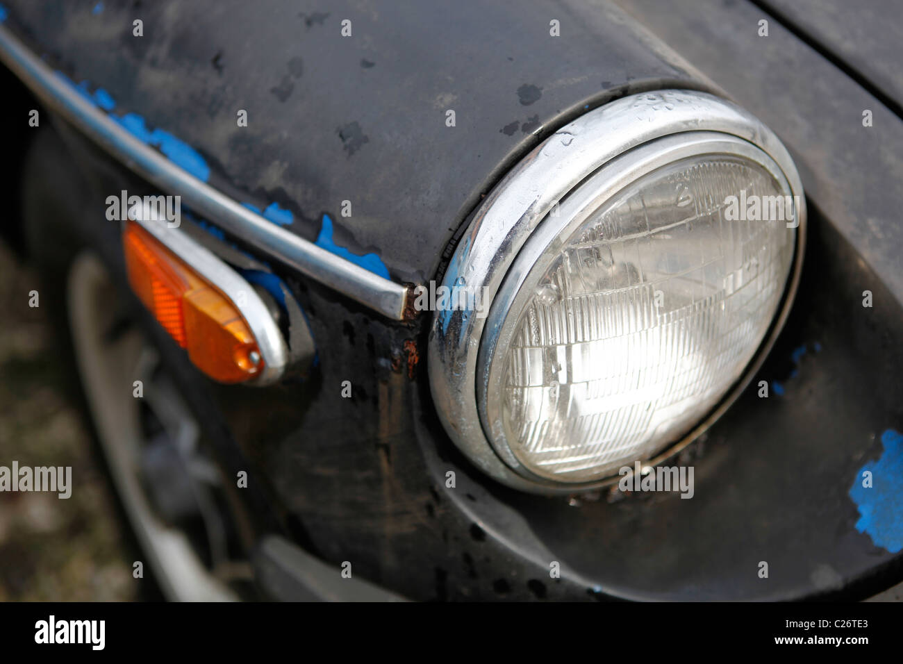 MG British Sportscar sits before auction sale next to a barn in rural Indiana. sports car headlight Stock Photo