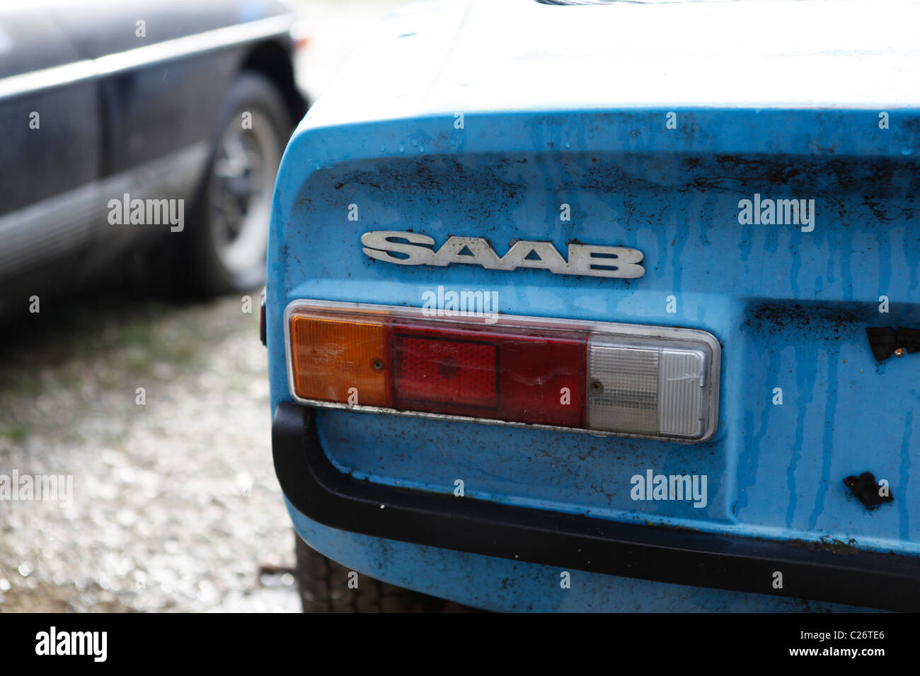 SAAB Sportscar sits before auction sale next to a barn in rural Indiana. sports car Stock Photo