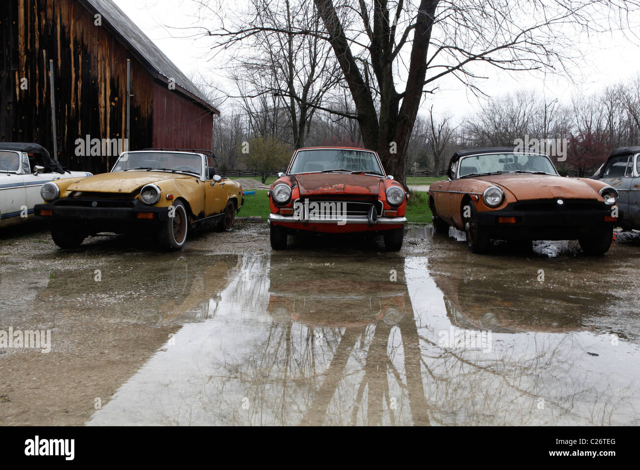 MG British Sportscar sits before auction sale next to a barn in rural Indiana. sports car Stock Photo