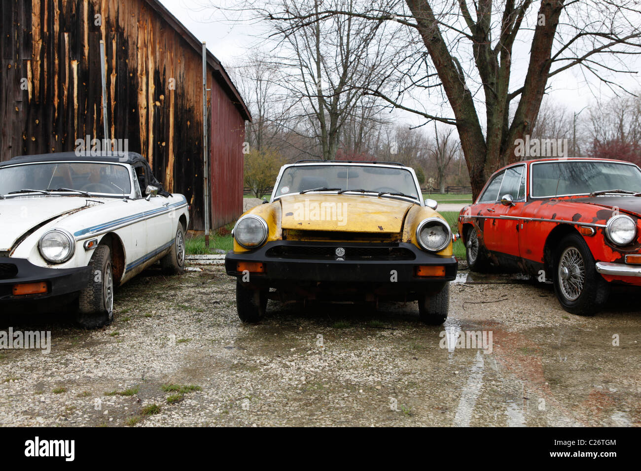 MG British Sportscar sits before auction sale next to a barn in rural Indiana. sports car Stock Photo
