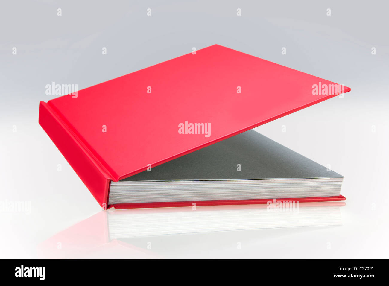 Red book, open, with plain hard cover, for design layout Stock Photo