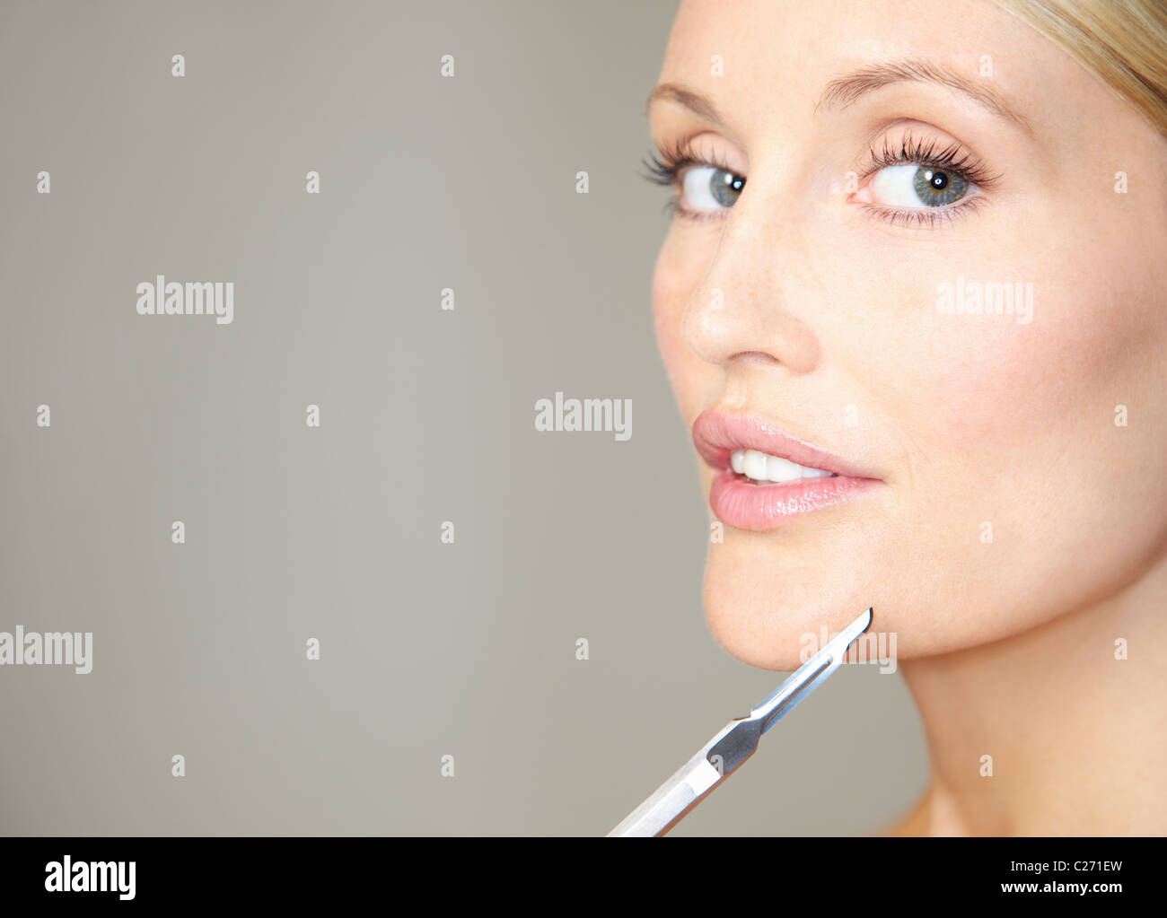 Facelift woman scalpel hires stock photography and images Alamy