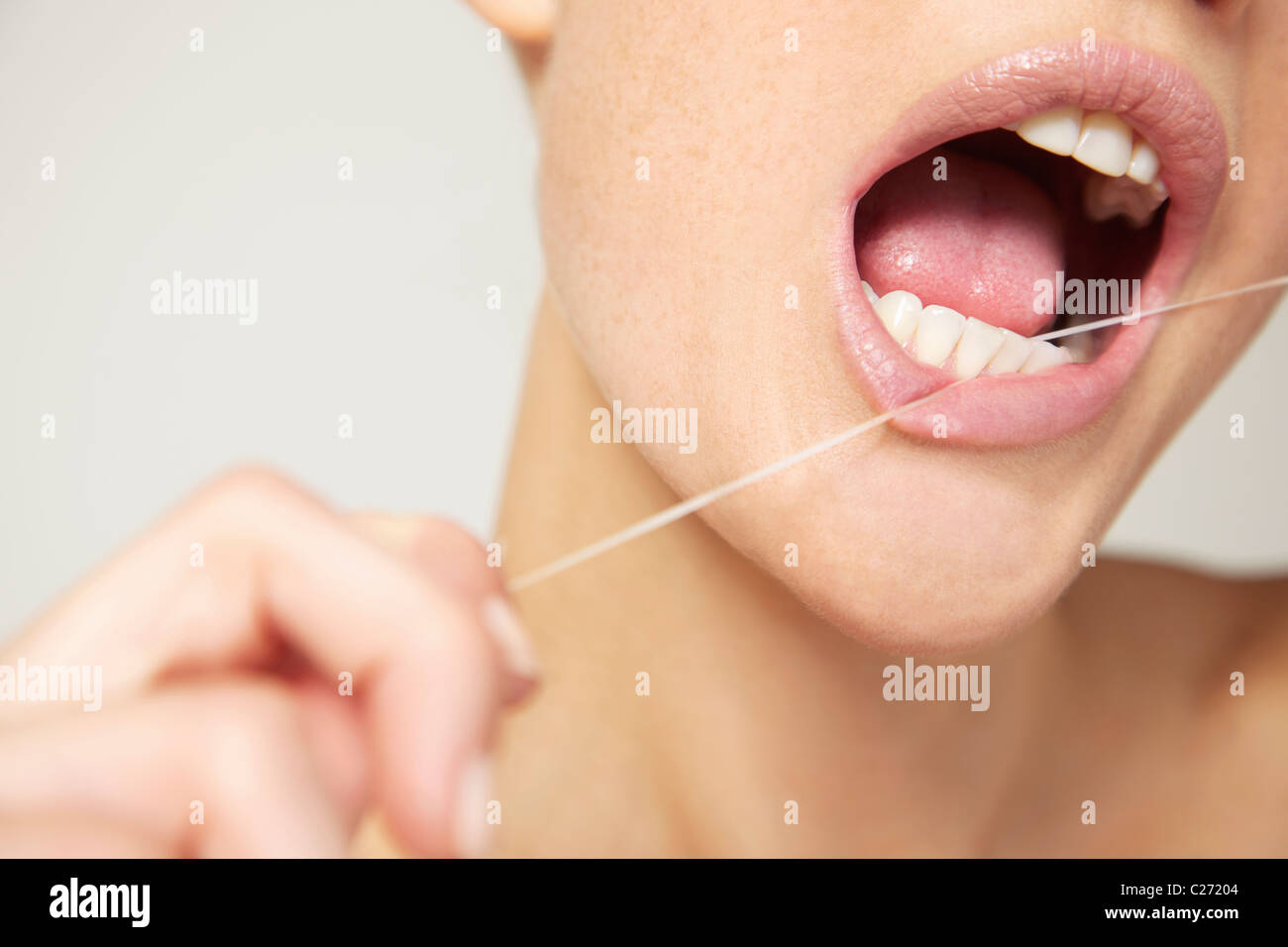 Adult Flossing Teeth High Resolution Stock Photography and Images Alamy