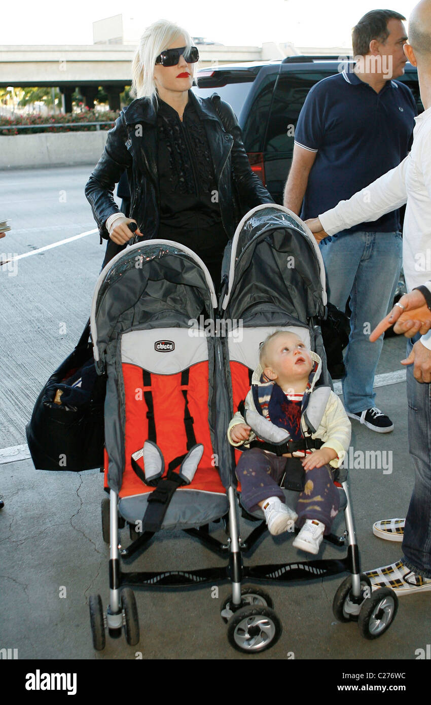 Gwen Stefani pushes Zuma Rossdale in his buggy at LAX airport Los