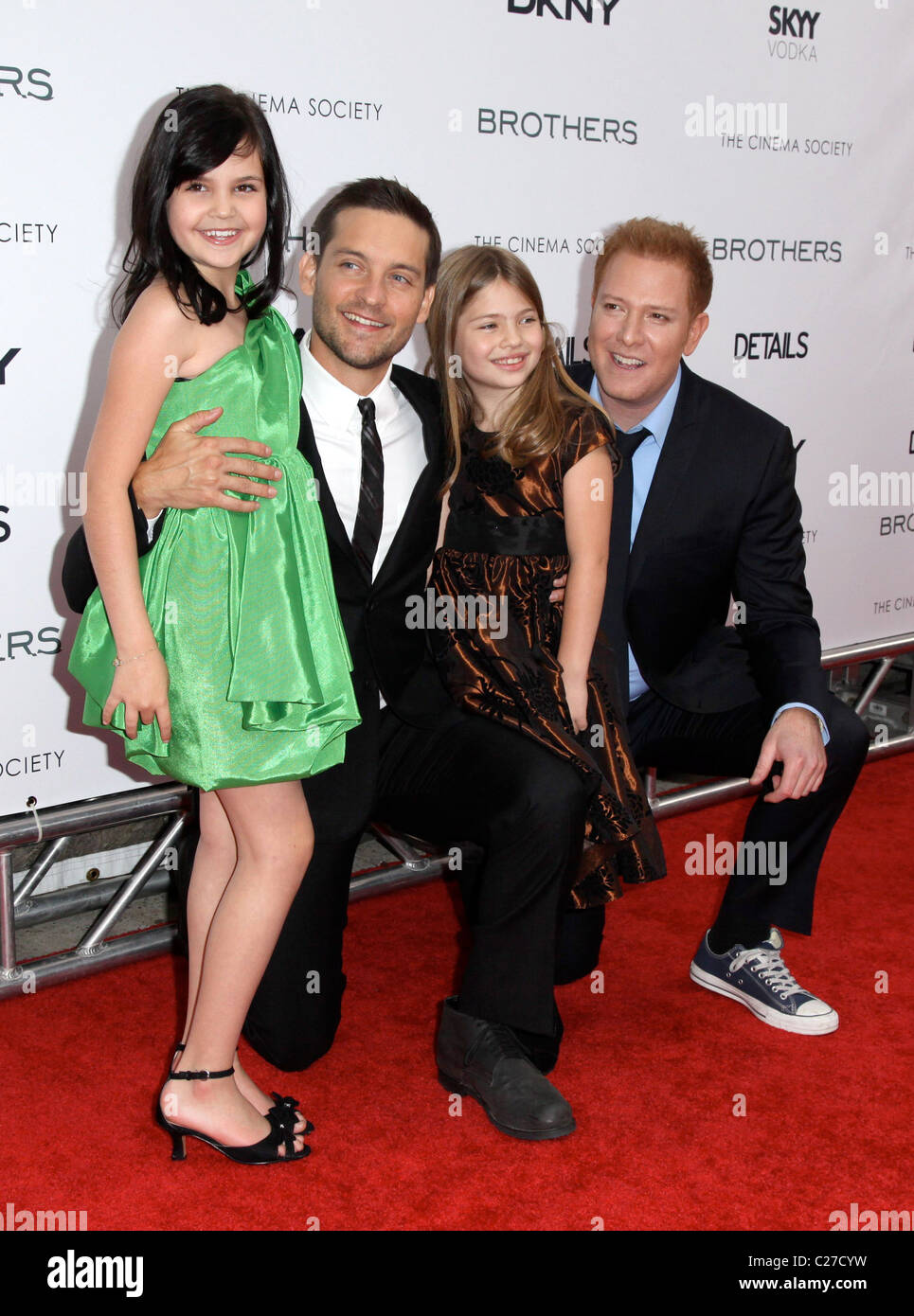 L-R) Bailee Madison, Tobey Maguire and Taylor Geare and producer Ryan  Kavanaugh, attends The Cinema Society, Details and DKNY Stock Photo - Alamy