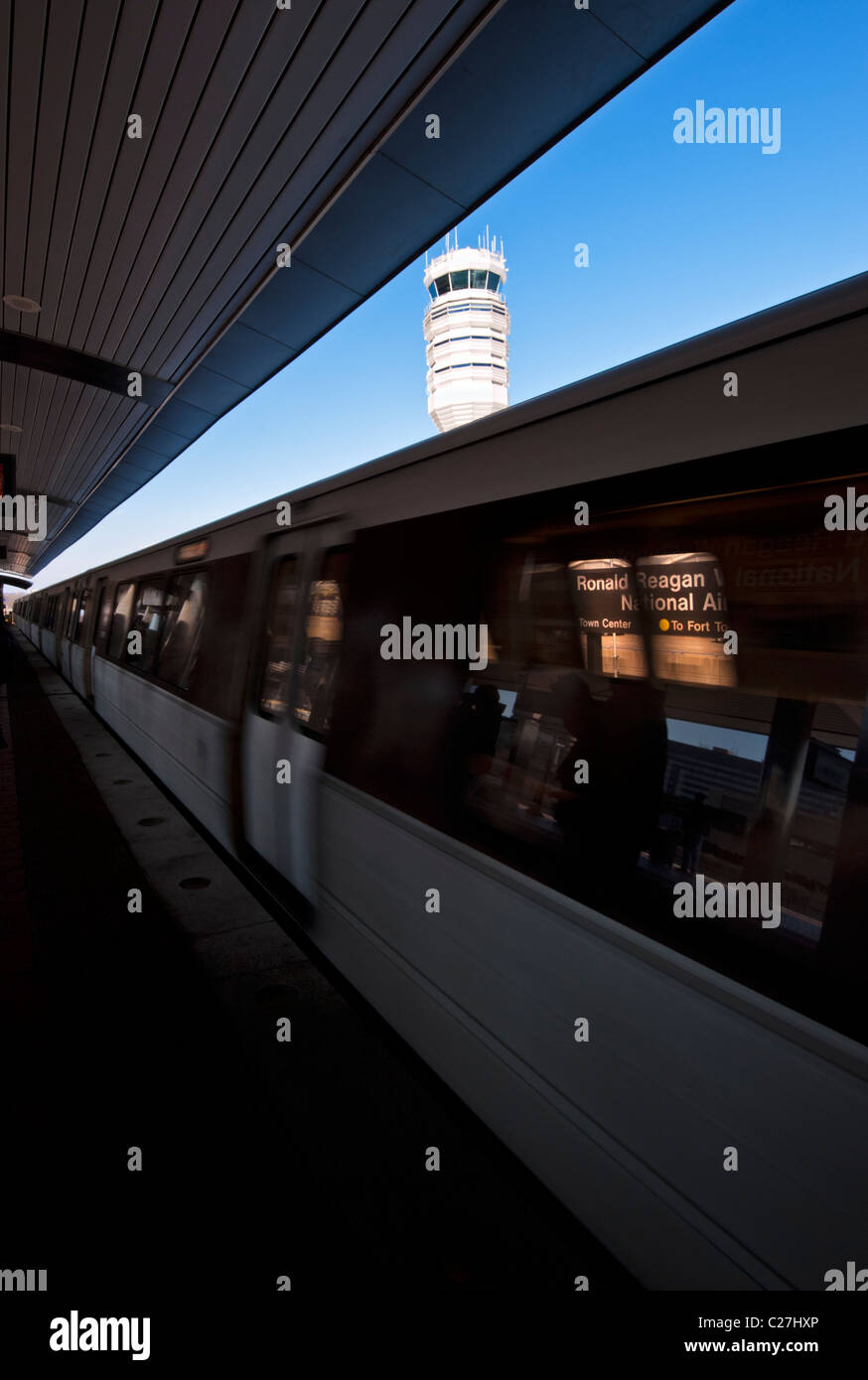 Ronald Reagan Washington National Airport sign and control tower. An artistic view from the metro rail station. Stock Photo