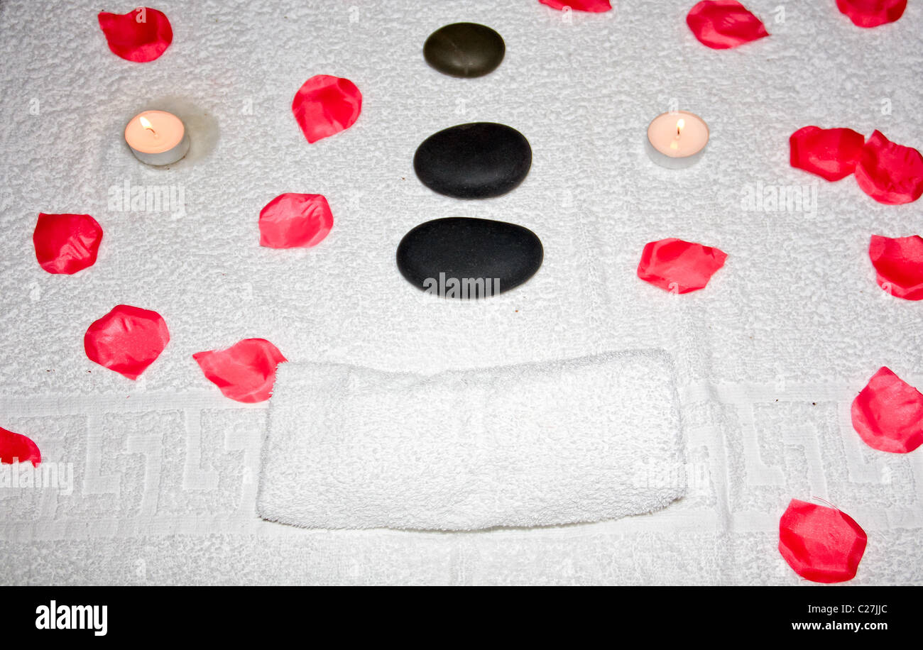 Decorated massage table in spa Stock Photo