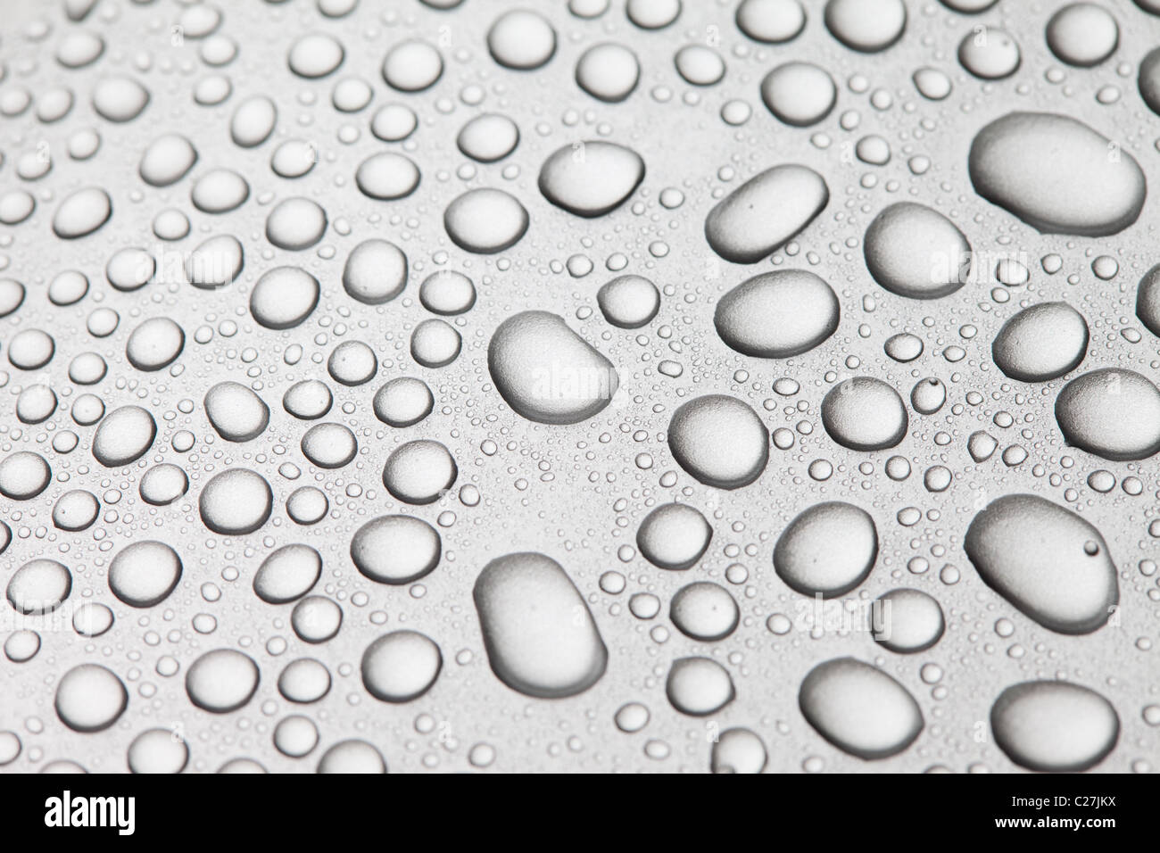 Water drops over background Stock Photo - Alamy