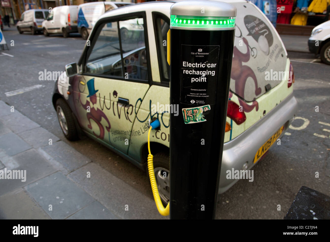 G-Wiz electric car at recharging point in Central London Stock Photo