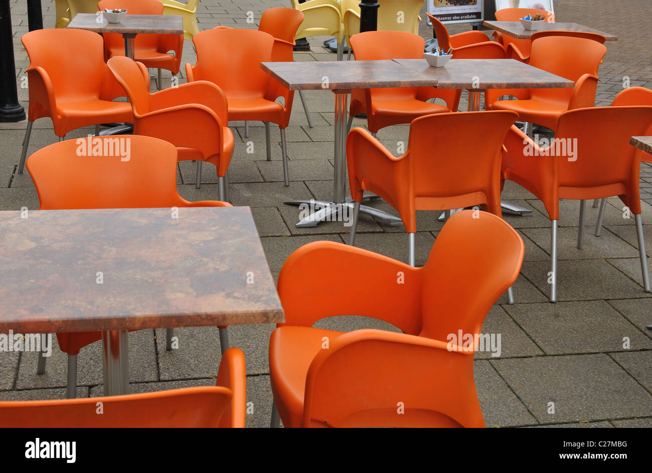 Orange plastic chairs Stock Photo Alamy
