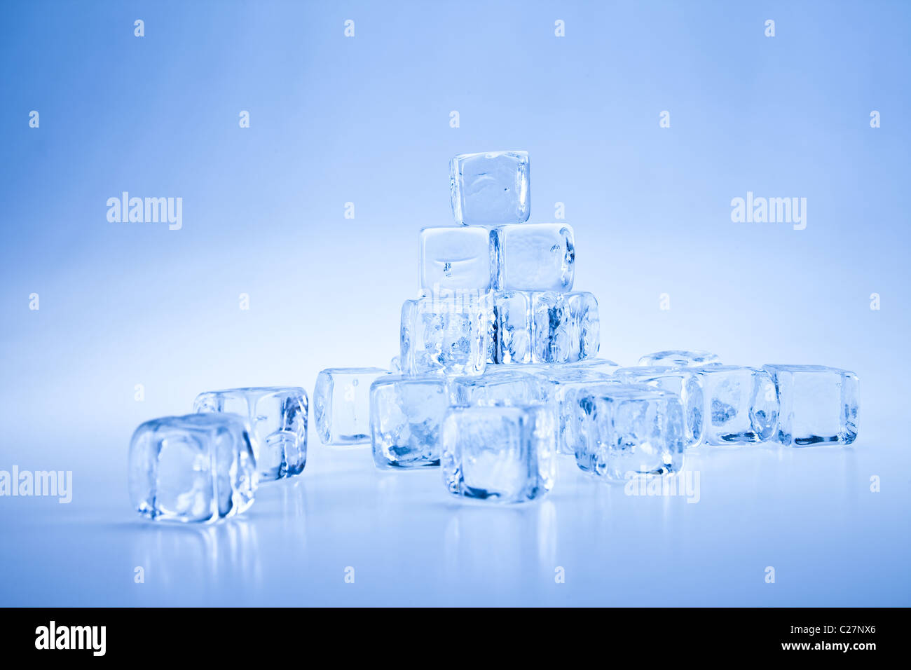 Frozen ice cubes over background Stock Photo - Alamy