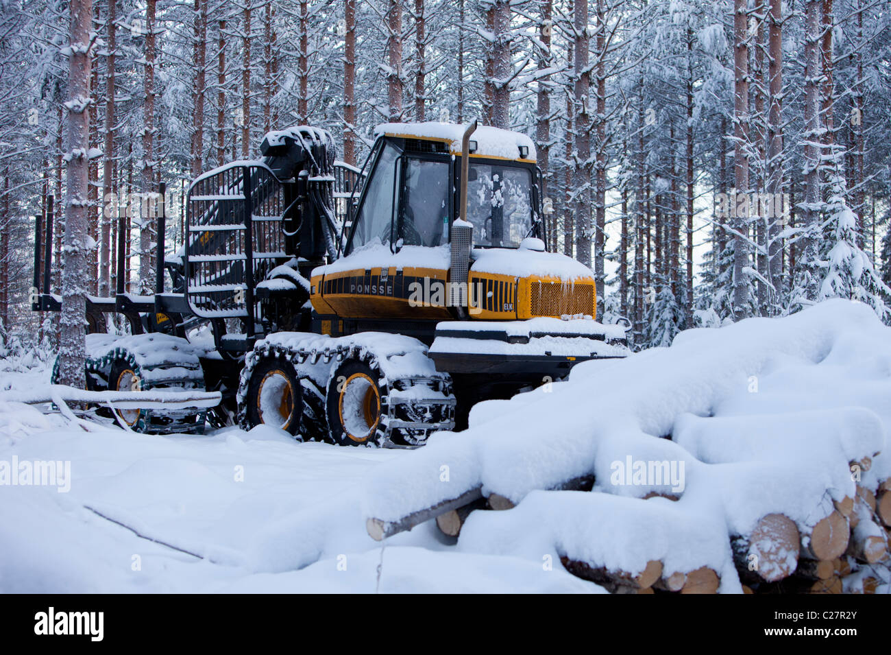 Ponsse Elk forwarder forest harvester in forest at Winter , Finland