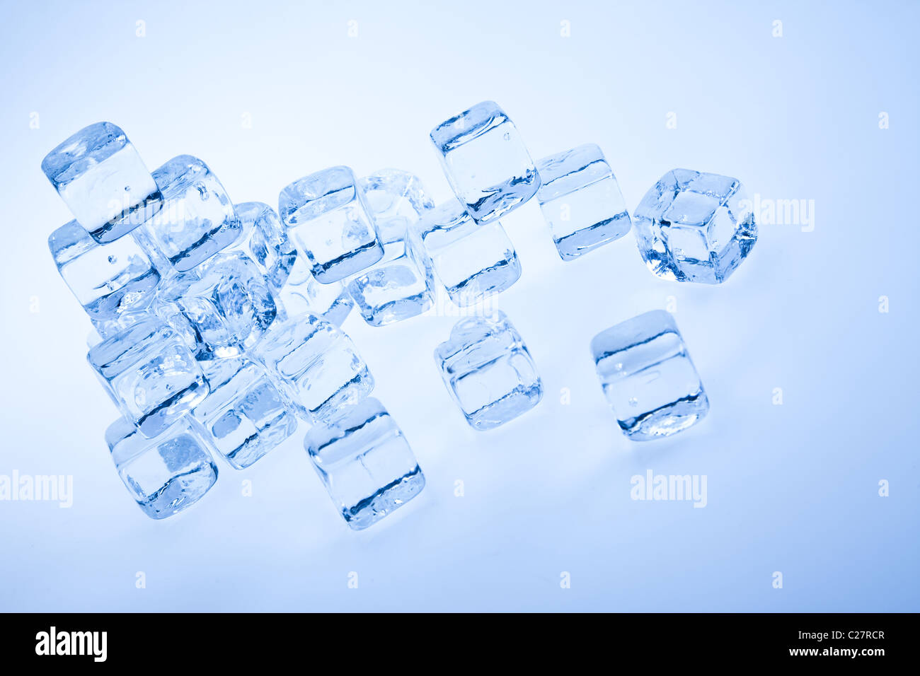 Frozen ice cubes over background Stock Photo - Alamy