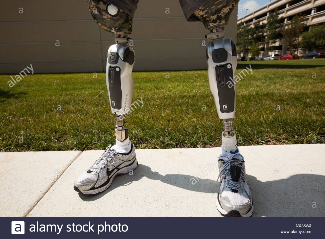 A wounded soldier wearing batterypowered prosthetic legs Stock Photo