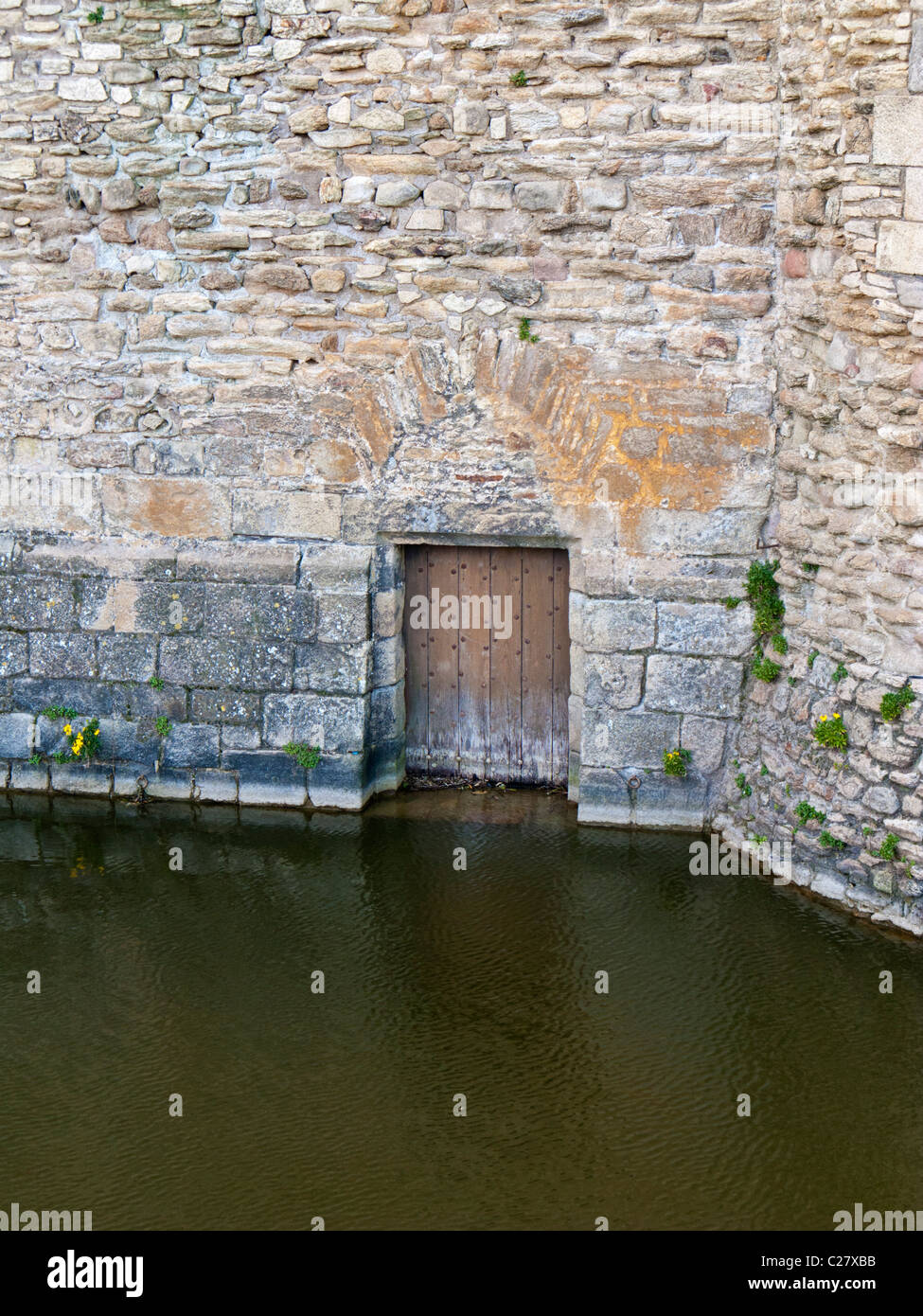 Moat and doorway at water level in the castle wall at Château de Suscinio, Morbihan, Brittany, France, Europe Stock Photo