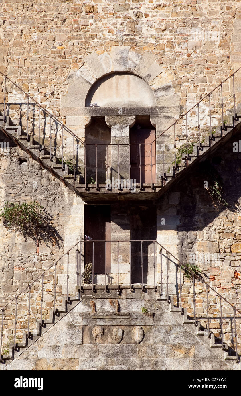 Stairs in Florence Italy on the side of an old brick building near Piazza MIchealangelo Stock Photo