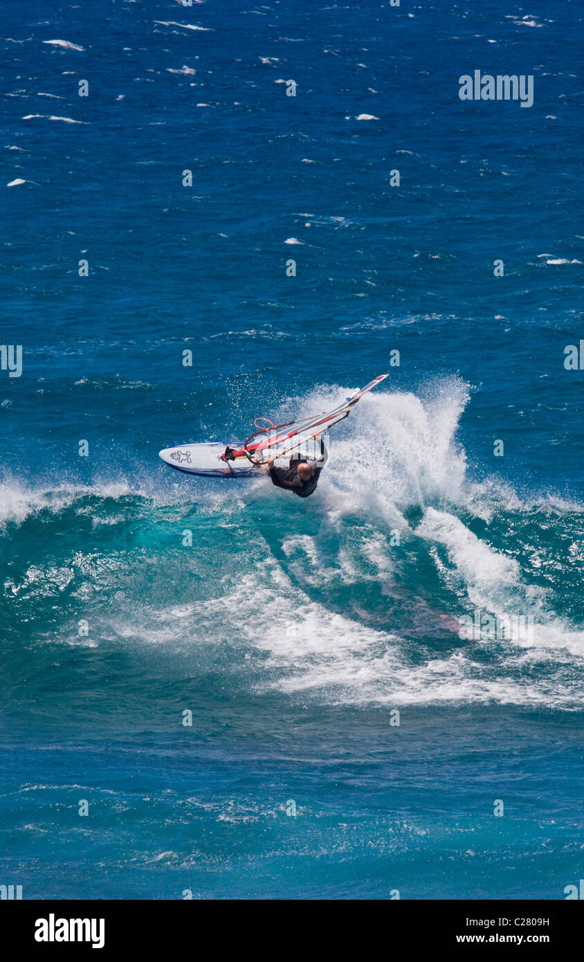 Drop Shadow. Extreme Windsurfing on Mauis famous Hookipa Beach, located