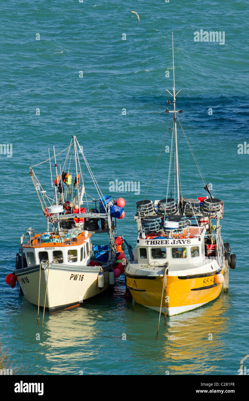 Two fishing boats moored in Newquay harbour, Cornwall UK. Stock Photo