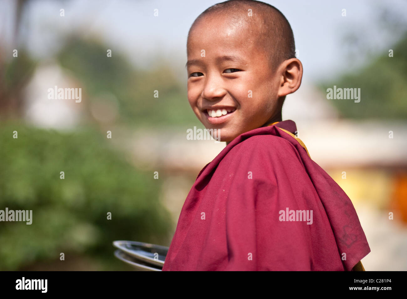 A boy monk who study in a Bhutanese monastery in Bodhgaya Stock Photo ...