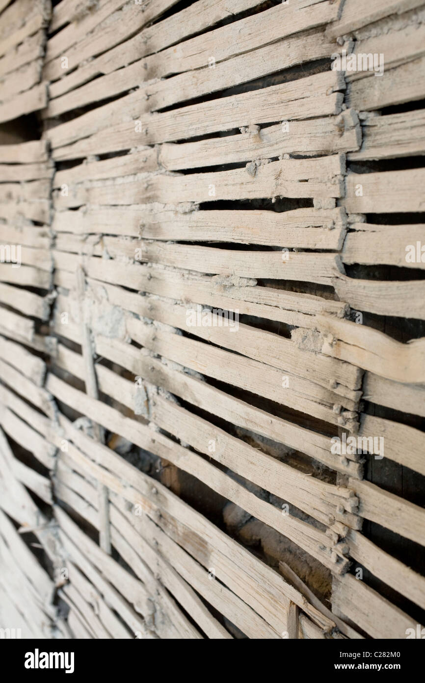 Lath wall with plaster removed Stock Photo