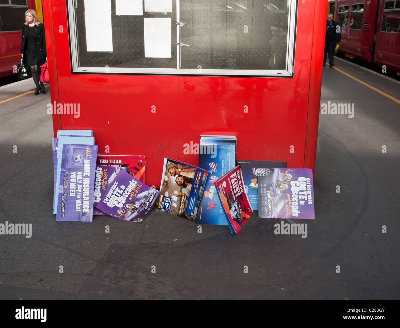 promotional material dumped on station at waterloo London England Stock
