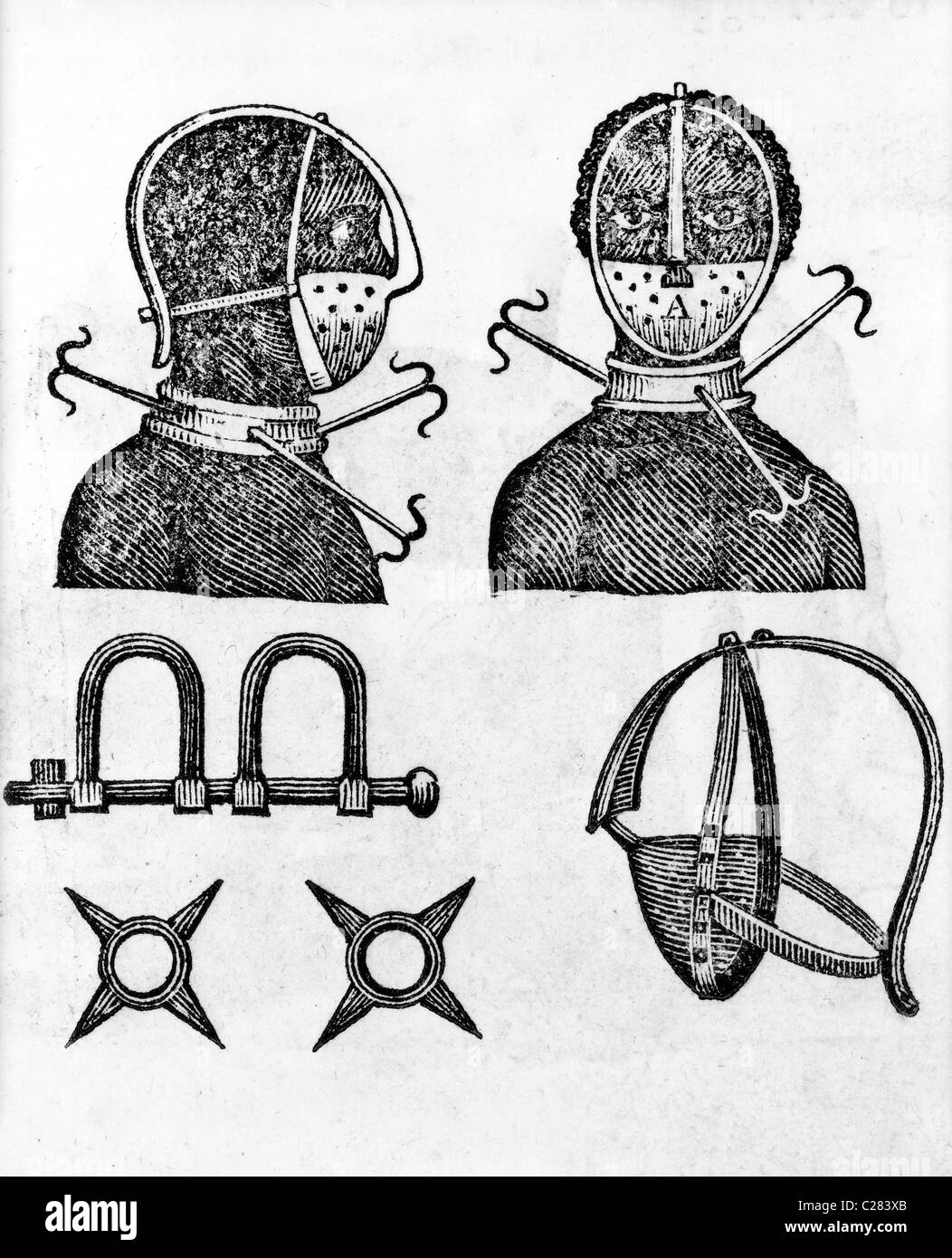 Iron mask, collar, leg shackles and spurs used to restrict slaves Stock Photo