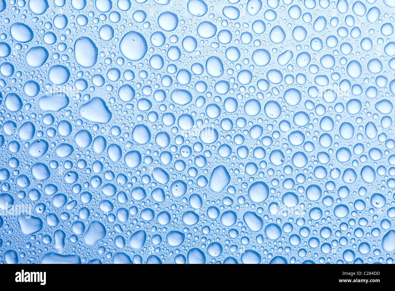 Water drops over background Stock Photo - Alamy