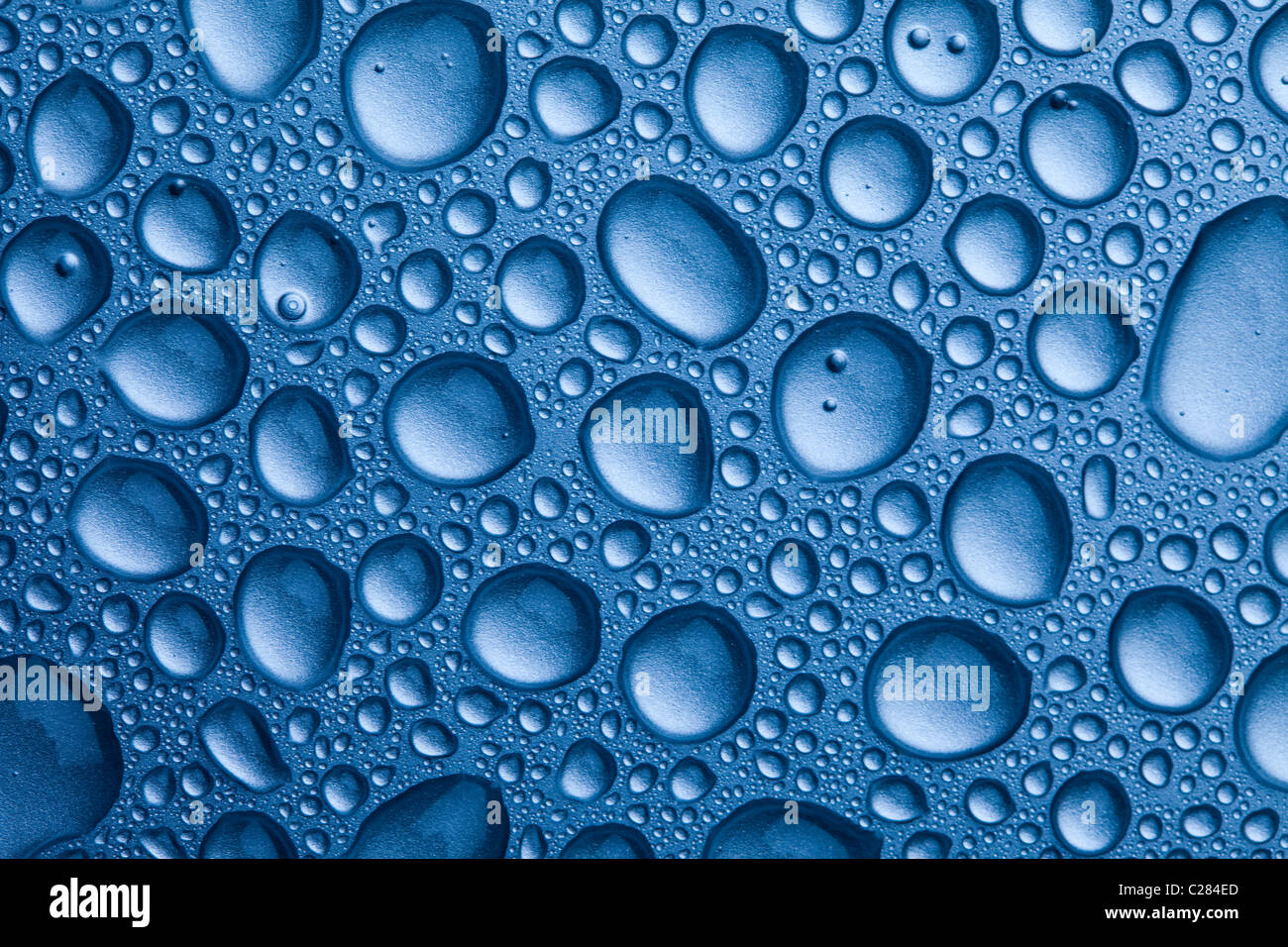 Water drops over background Stock Photo - Alamy