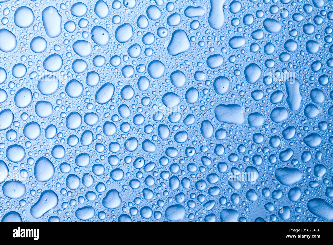 Water drops over background Stock Photo - Alamy