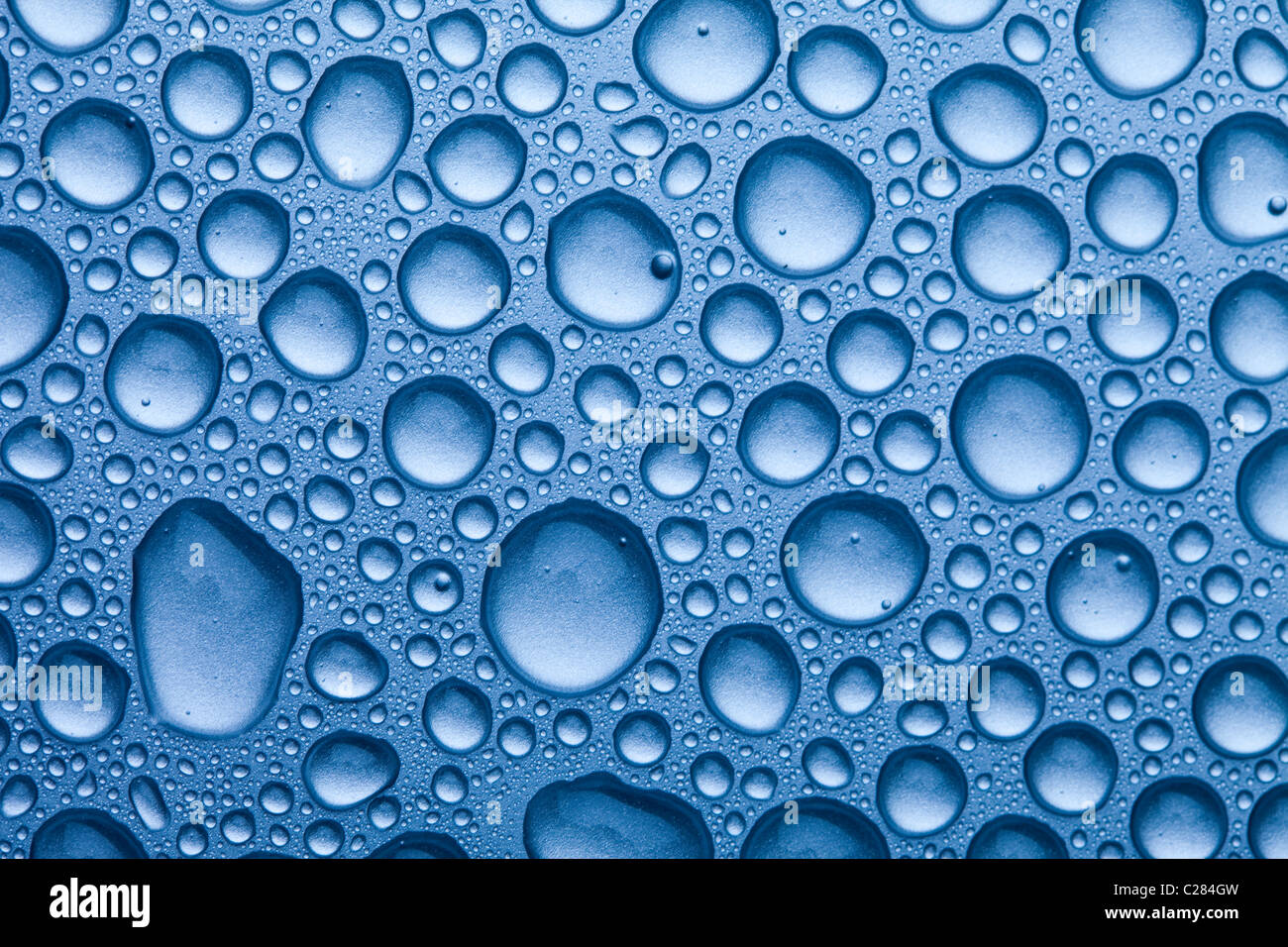 Water drops over background Stock Photo - Alamy