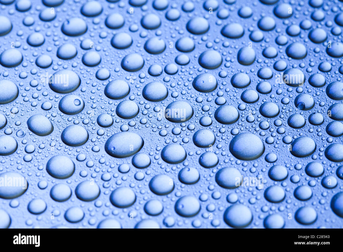 Water drops over background Stock Photo - Alamy