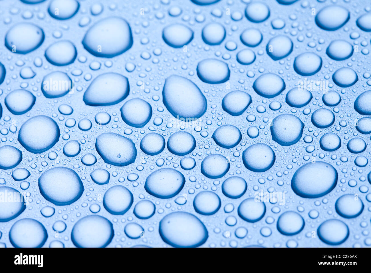 Water drops over background Stock Photo - Alamy