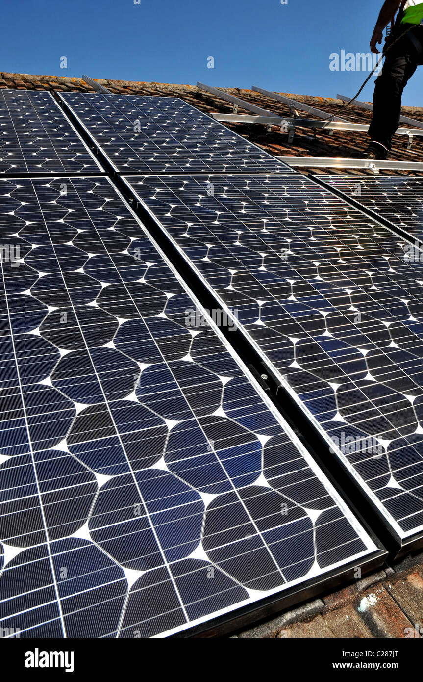 Solar panels installed on a house roof, Britain, UK Stock Photo