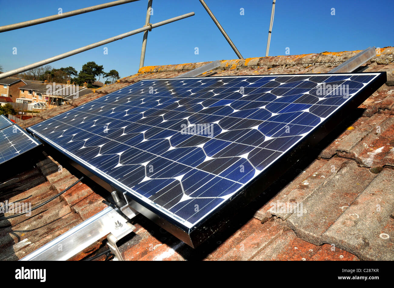 Solar panel installed on a house roof, Britain, UK Stock Photo