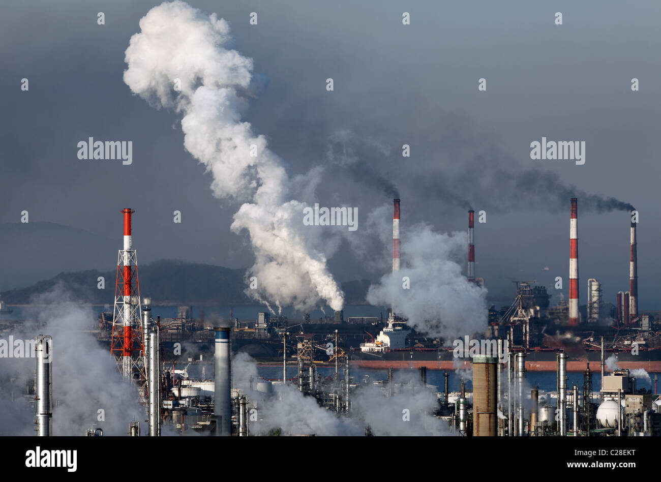 Industrial plant With Smoke Stacks, Industrial area Stock Photo