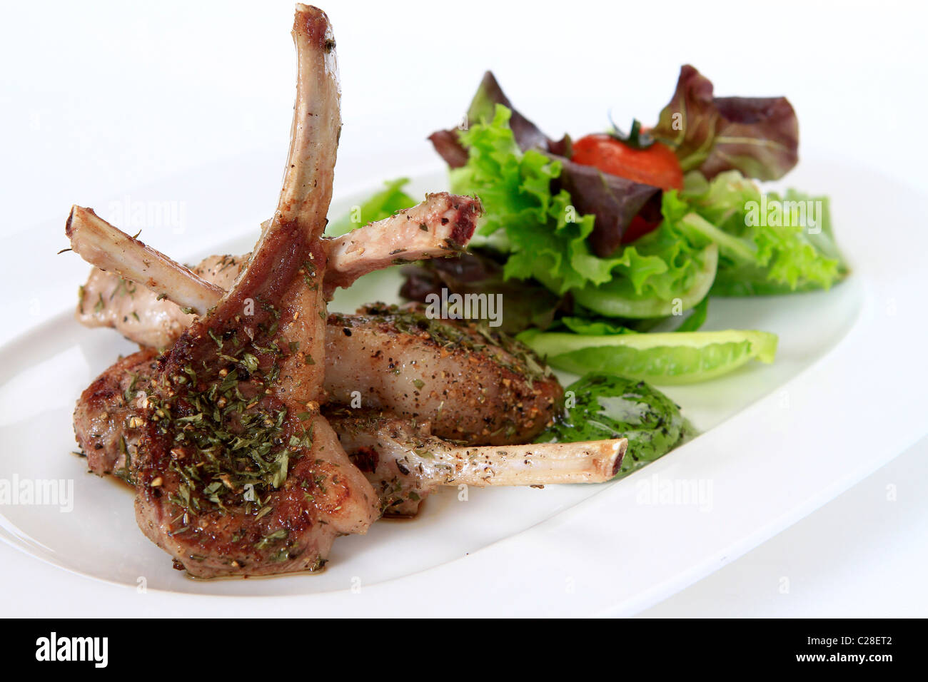 Grilled Lamb with Mint Jelly and Salad Stock Photo - Alamy