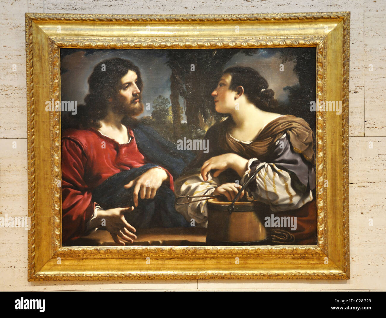 Christ And The Woman Of Samaria by Guercino (Giovanni Francesco Barbieri) 1619-20 - Editorial use only. Stock Photo