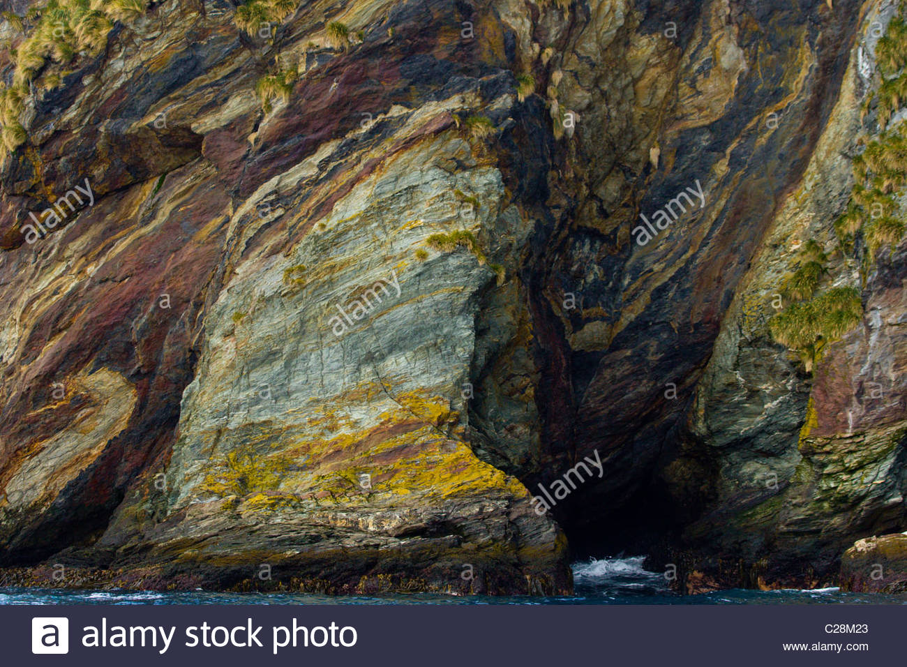 Metamorphic Beach Rocks Metamorphic rocks along a rugged coastline Stock Photo - Alamy