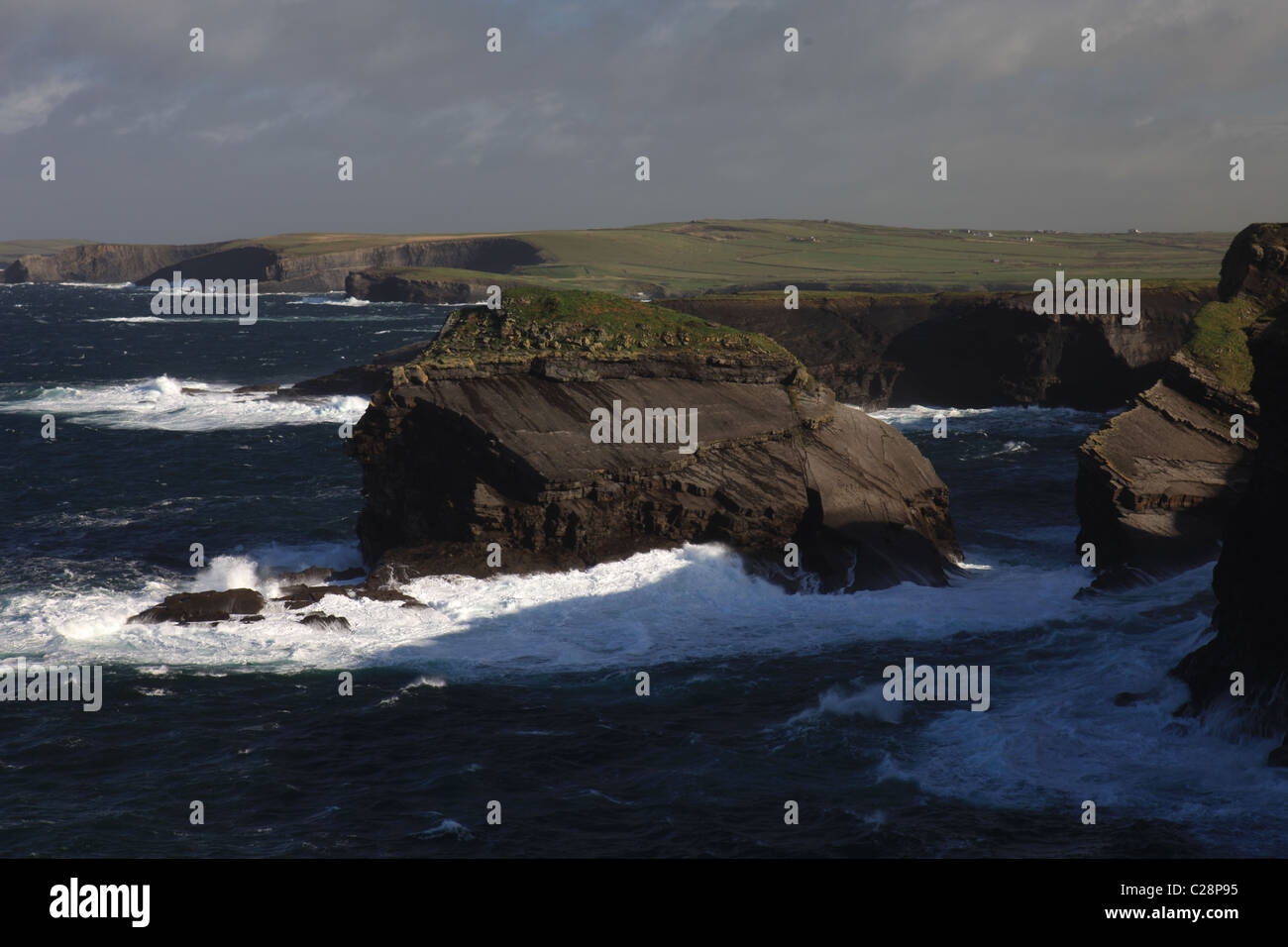 ireland county clare, atlantic sea waves crashing onto irish landmass