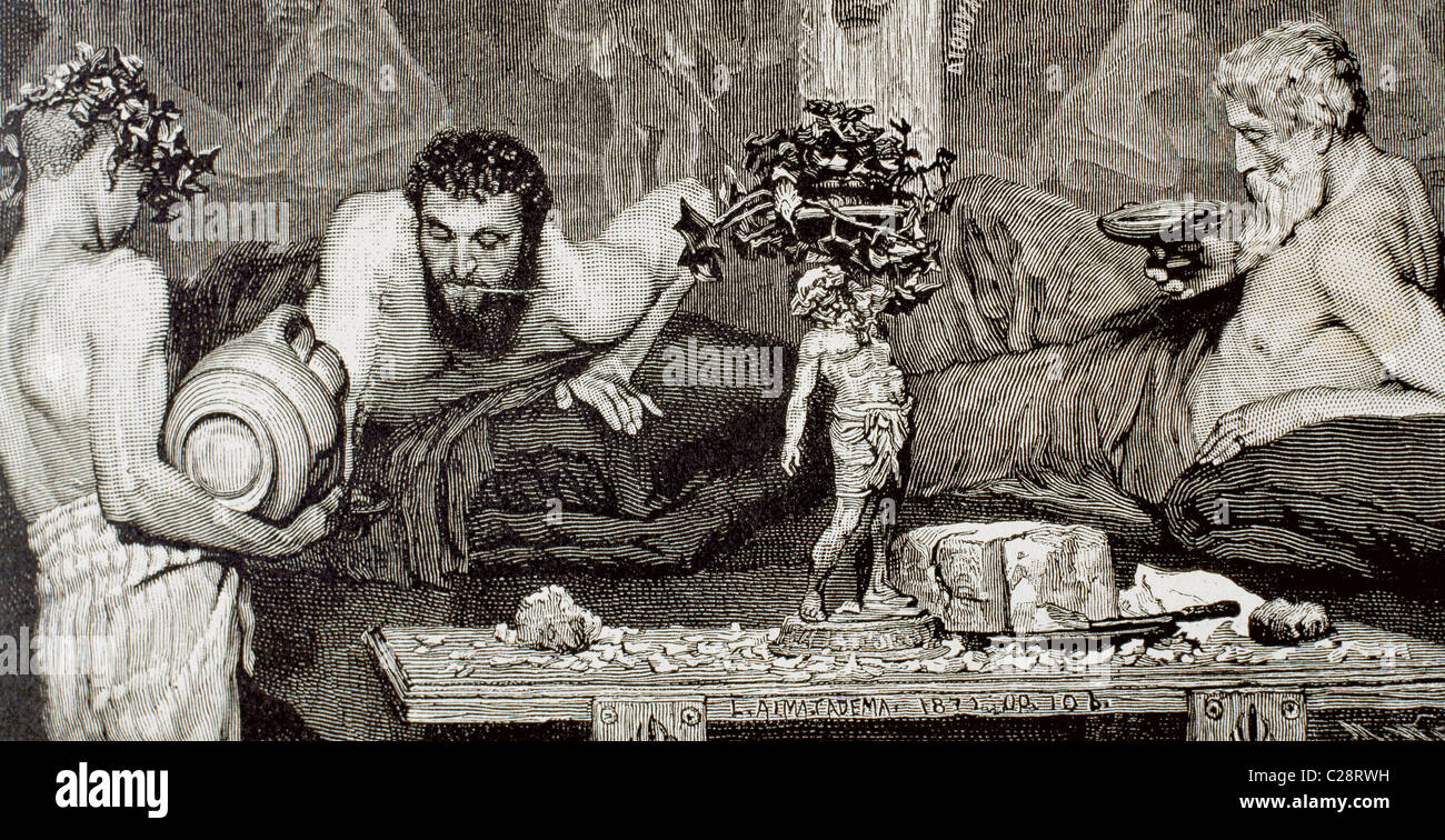 Ancient Rome. Young slave serving patricians who are lying on a triclinium during a banquet. Stock Photo
