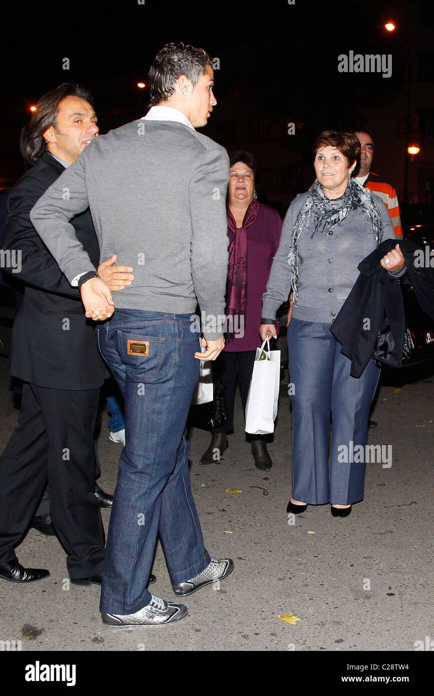 Cristiano Ronaldo leaving a restaurant with his mother Maria Dolores ...