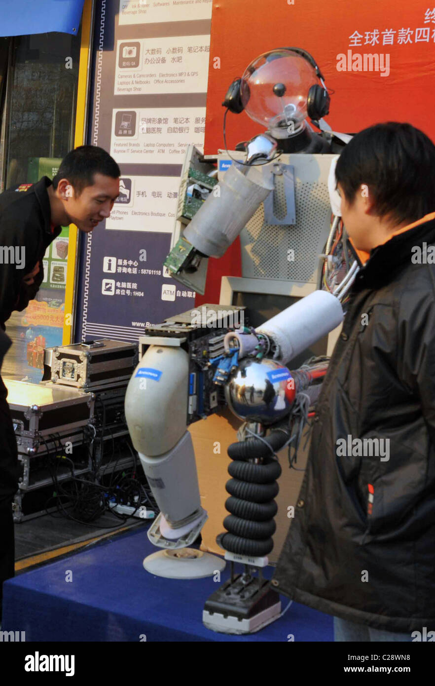 A robot made from discarded computer parts, on show at Bainaohui IT ...