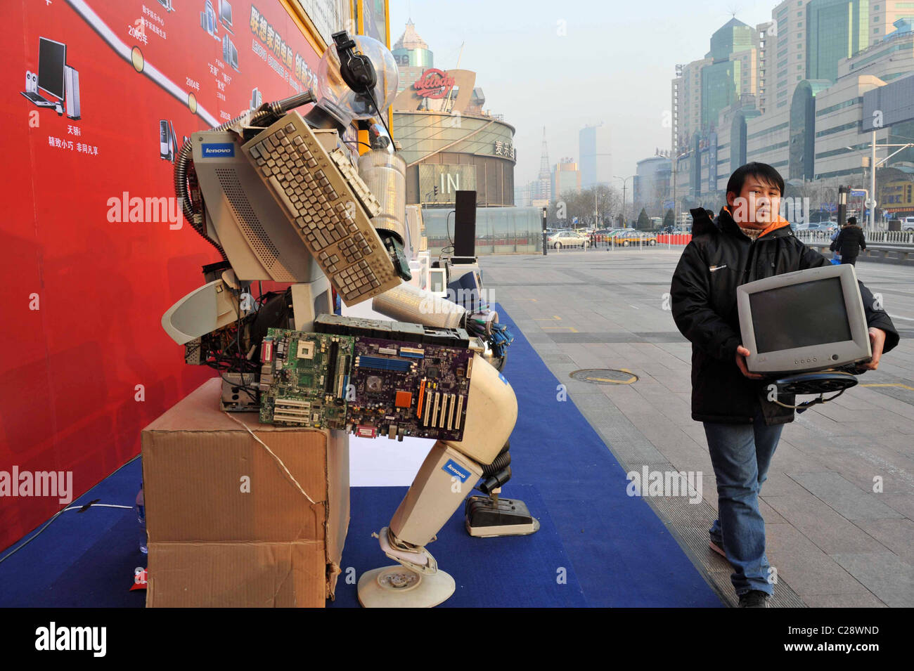 A robot made from discarded computer parts, on show at Bainaohui IT ...