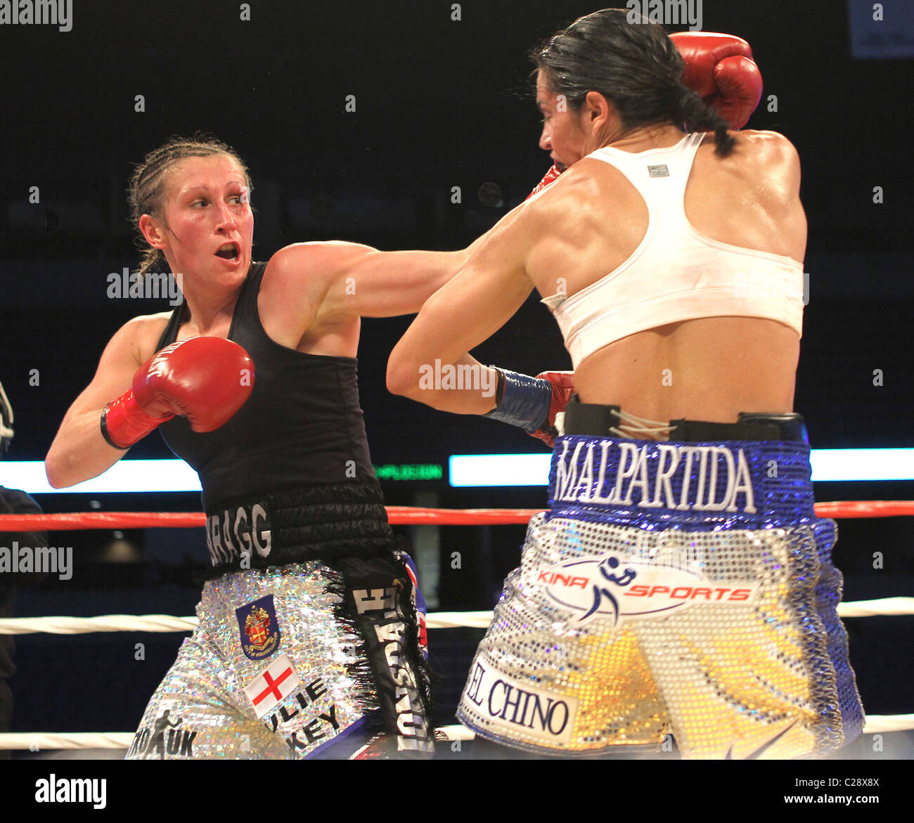 Peruvian boxer Kina Malpartida (R) fights against British Lindsay Scragg (L) during the Super Featherweight Boxing Fight at Stock Photo