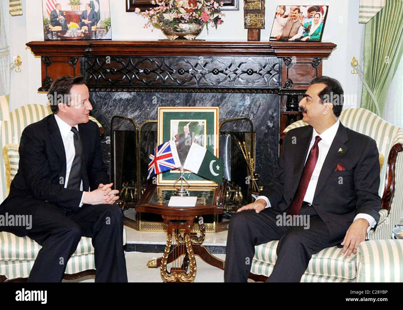 Prime Minister, Syed Yousuf Raza Gilani exchanges views with his British counterpart, David Cameron during meeting at PM House Stock Photo