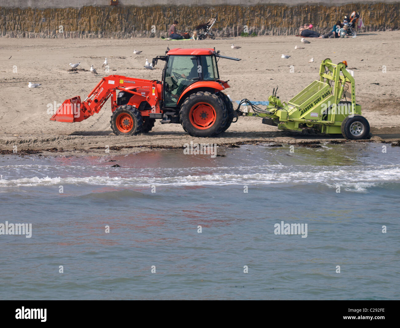 Barber Surf Rake clearing the beach, Looe, Cornwall, UK Stock Photo Alamy