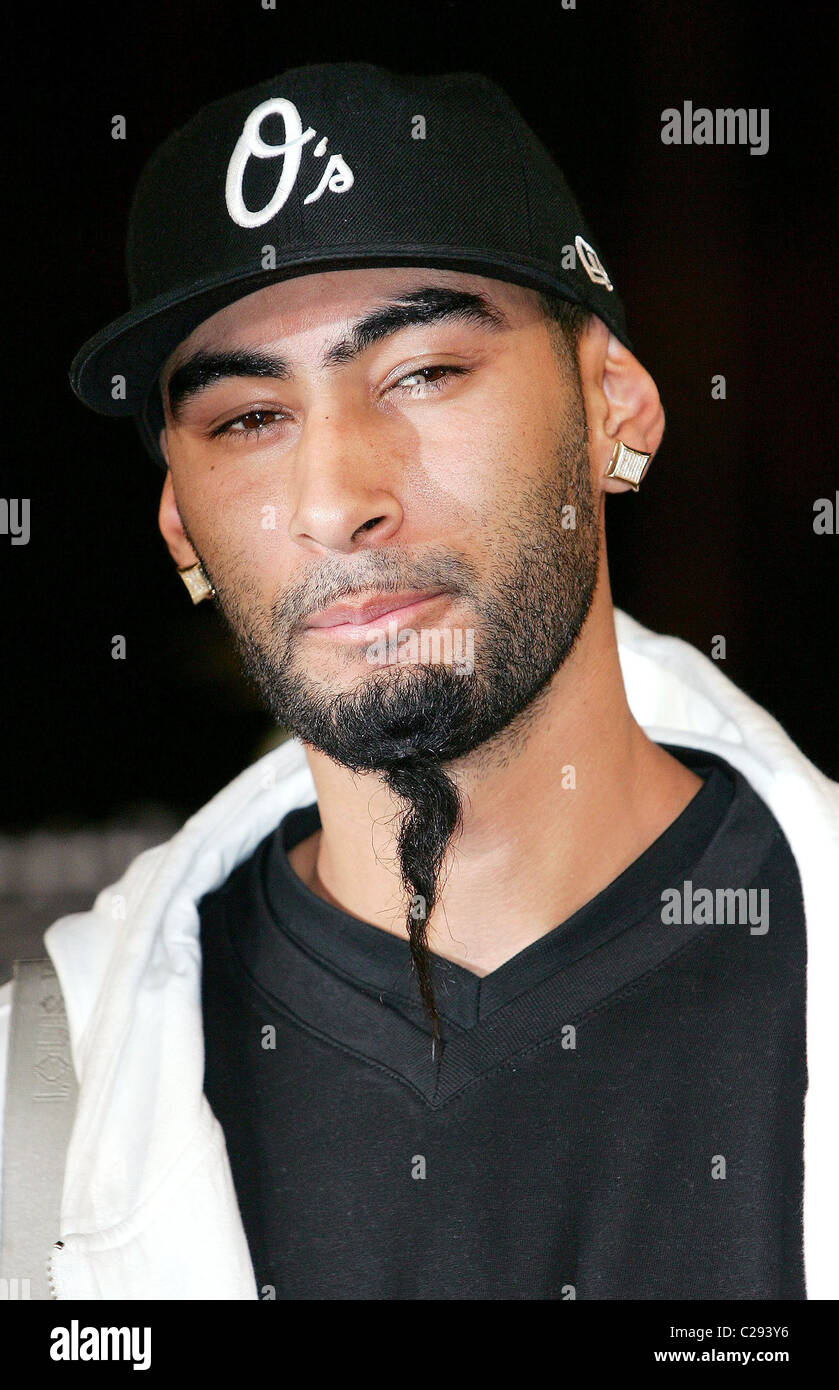 French Rapper La Fouine arrives at the tribute to actor Said