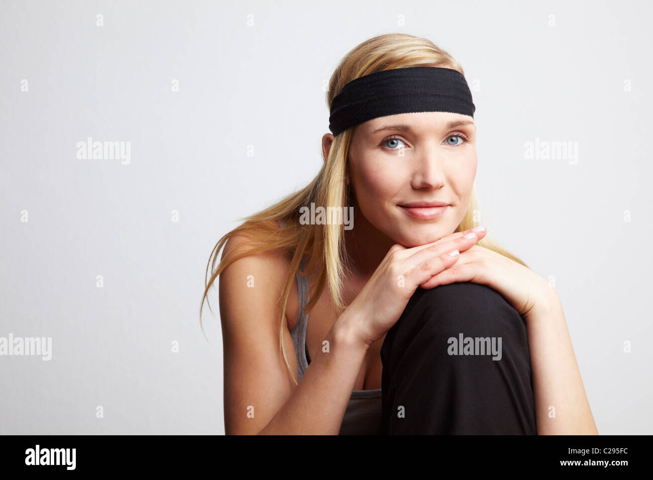 Woman with headband Stock Photo - Alamy