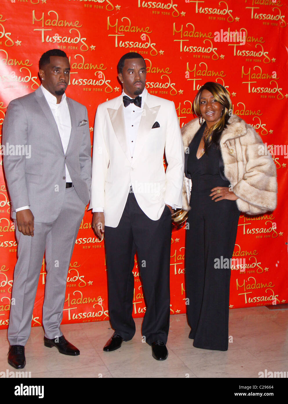 Sean Diddy Combs , his wax figure and his mother Janice Combs at the(05)