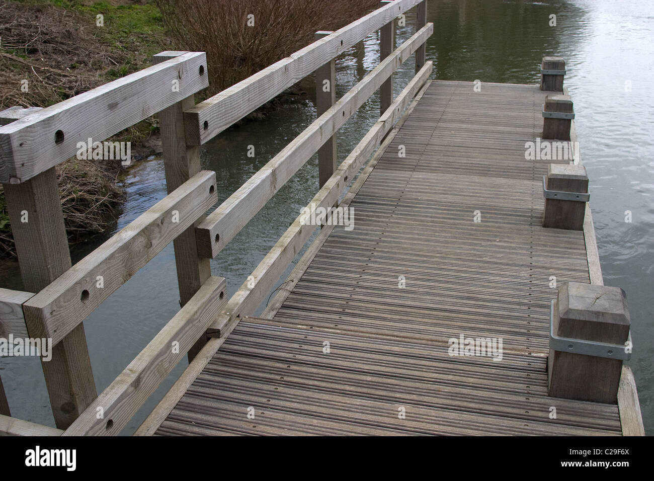 hidden concealed step wood decking canoe portege Stock Photo - Alamy